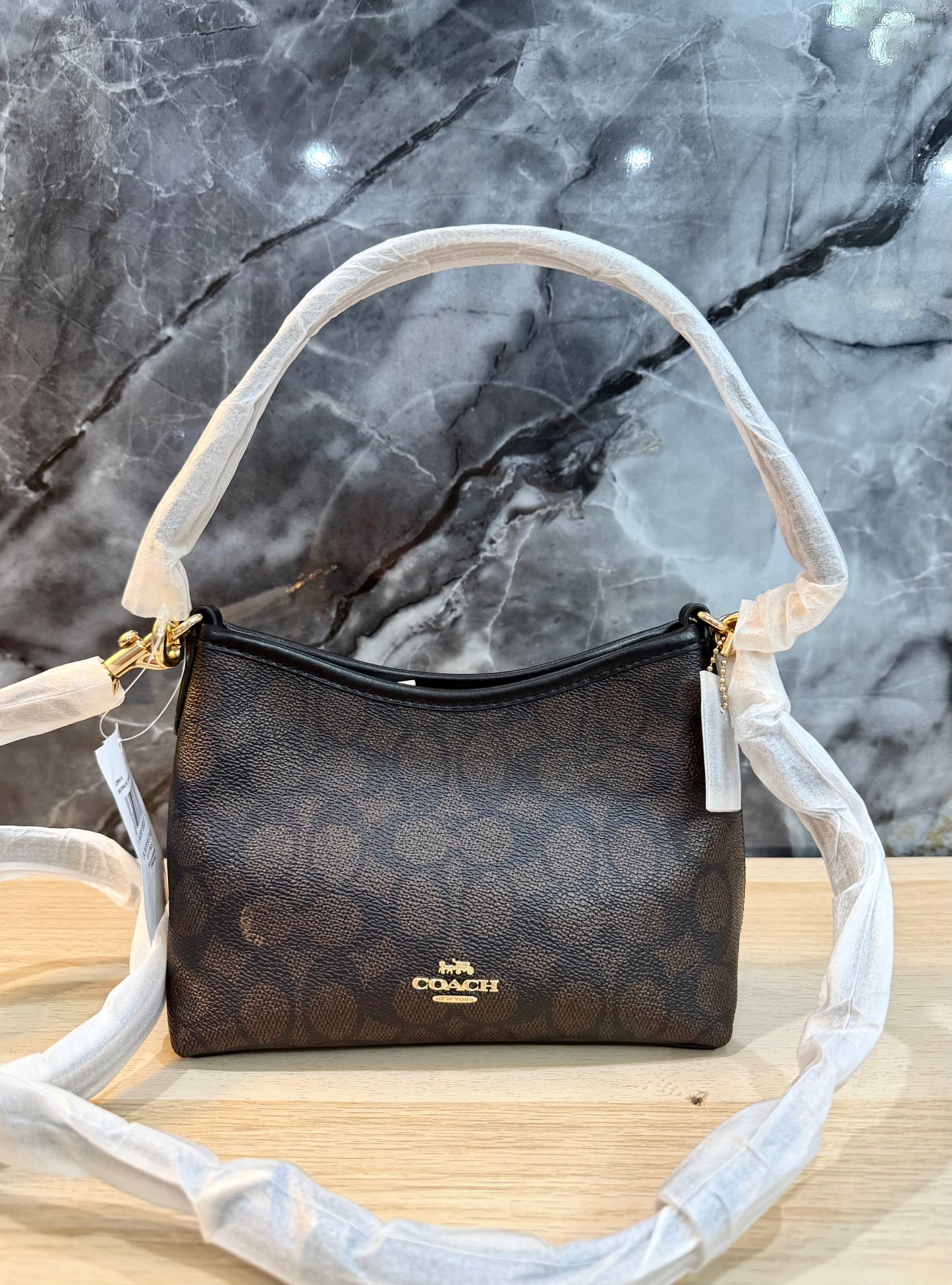 COACH SMALL LAUREL SIGNATURE COATED CANVAS