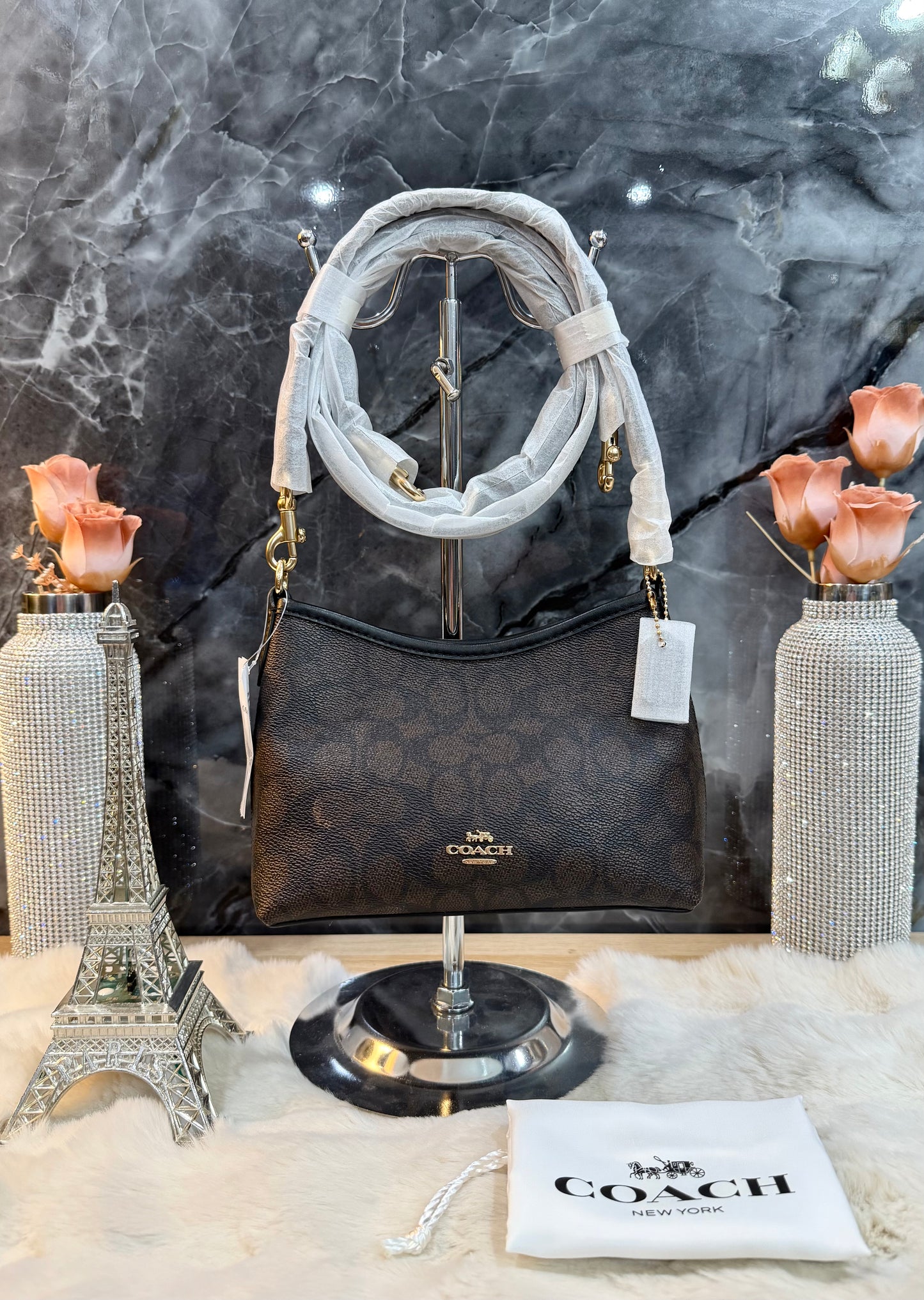 COACH SMALL LAUREL SIGNATURE COATED CANVAS