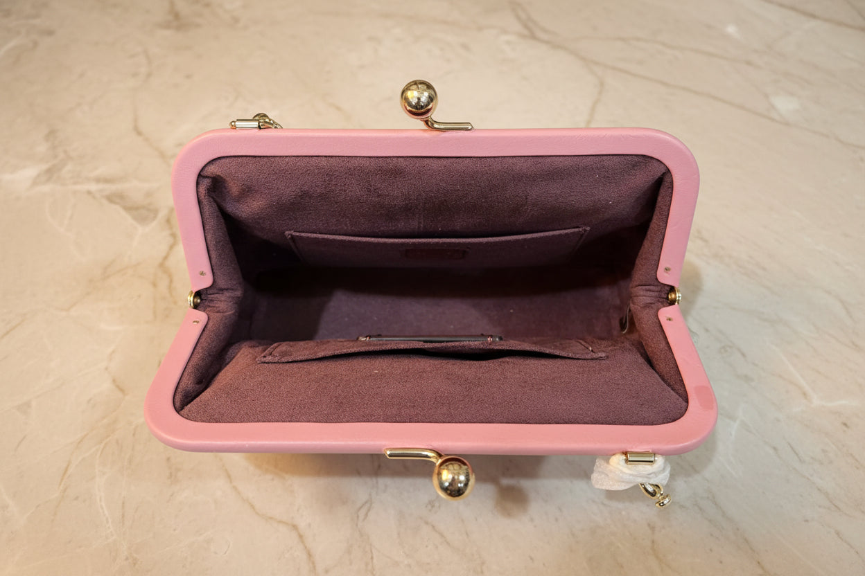 COACH NORA KISSLOCK CLUTCH/CROSSBODY IN SIGNATURE CHALK/IVORY/PINK