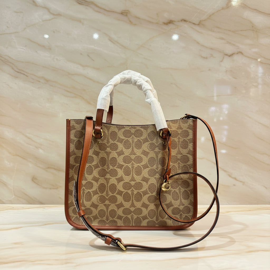 COACH TYLER CARRYALL 28 IN SIGNATURE CANVAS