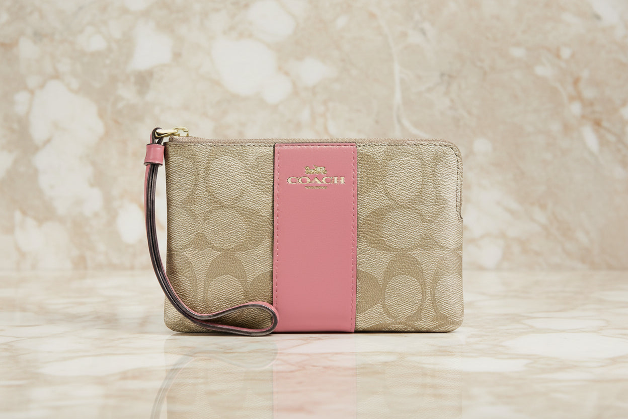 COACH SMALL CORNER SINGLE ZIP WRISTLET - SIGNATURE LIGHT KHAKI PINK