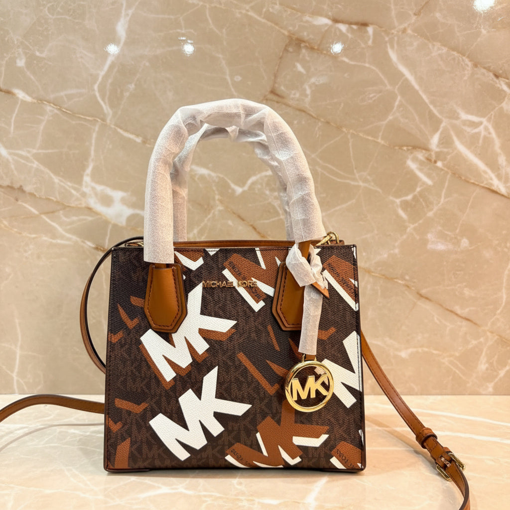 MICHAEL KORS MERCER MEDIUM MESSENGER BAG - LUGGAGE MULTI GRAPHIC LOGO