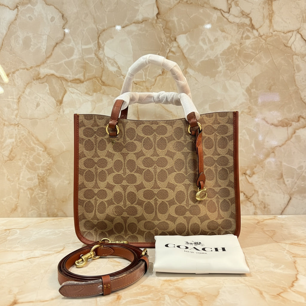 COACH TYLER CARRYALL 28 IN SIGNATURE CANVAS