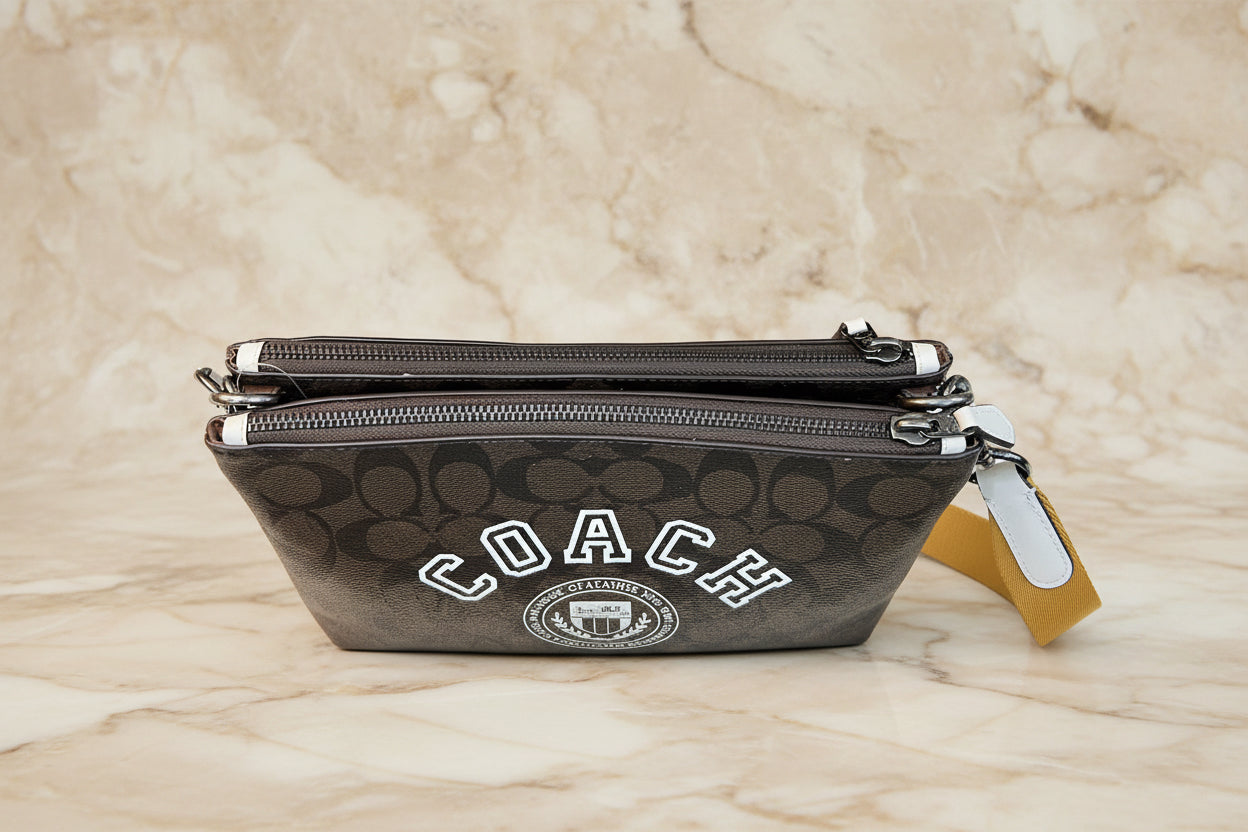 COACH EVERETTE CROSSBODY IN SIGNATURE CANVAS WITH VARSITY MOTIF