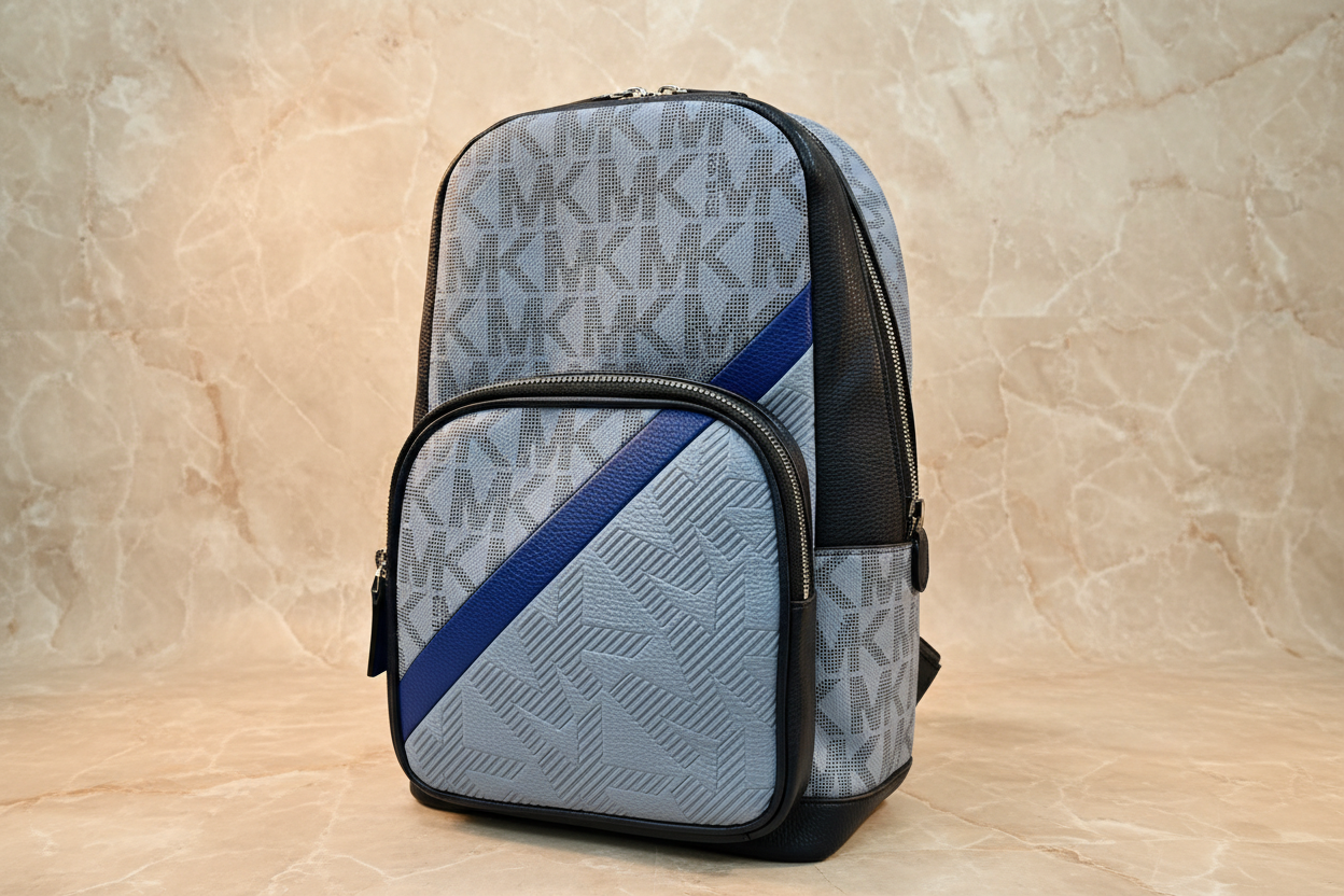 MICHAEL KORS COOPER COMMUTER SLINGPACK CHAMBRAY