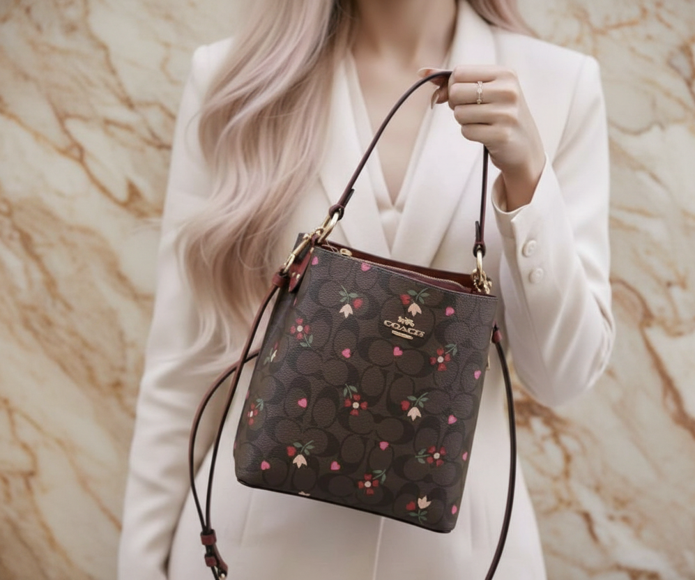 COACH SMALL TOWN BUCKET IN SIGNATURE CANVAS WITH HEART PETAL PRINT
