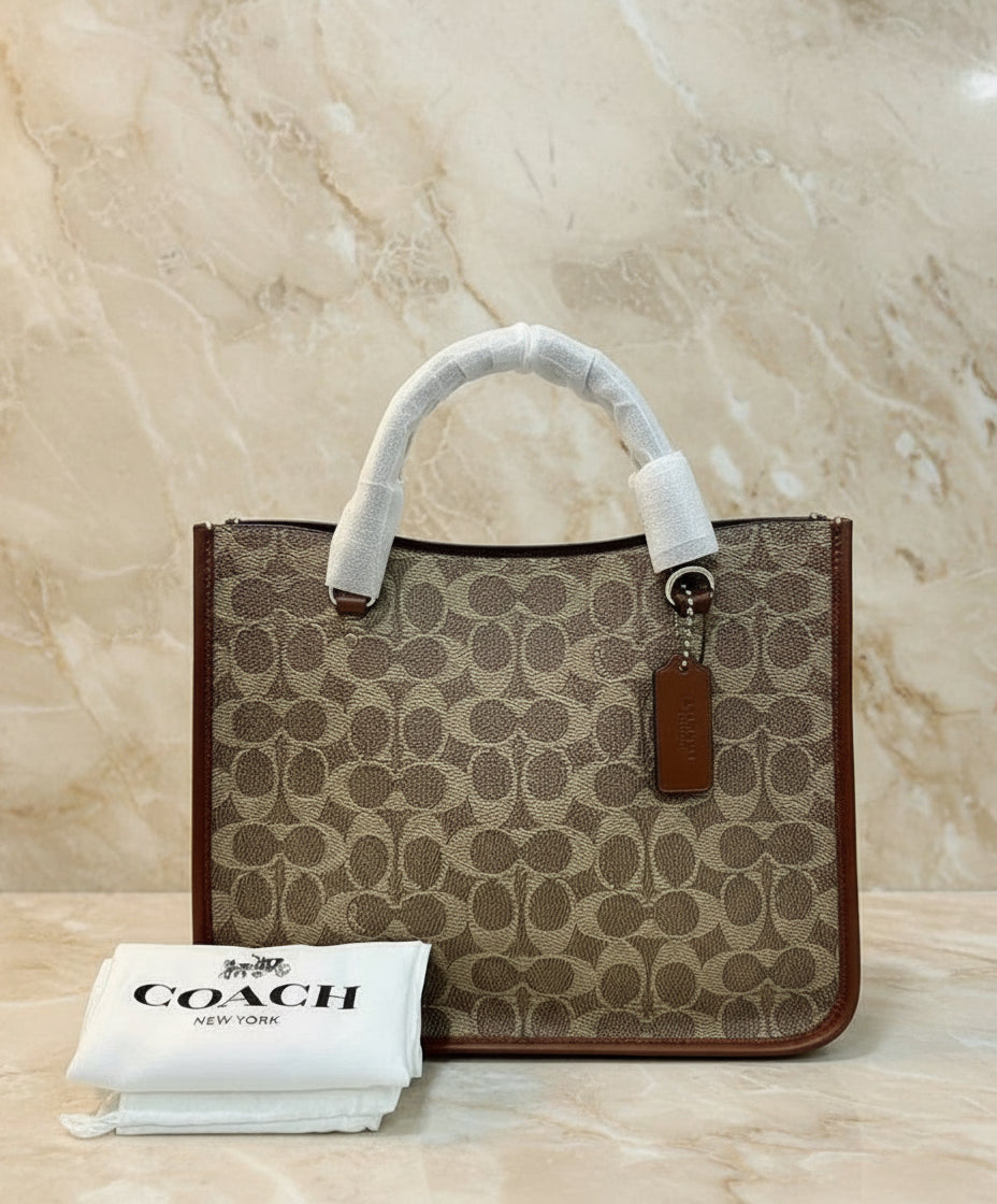 COACH TYLER CARRYALL 28 IN SIGNATURE CANVAS