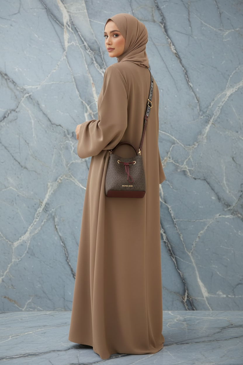 MICHAEL KORS SURI BUCKET IN SIGNATURE CANVAS