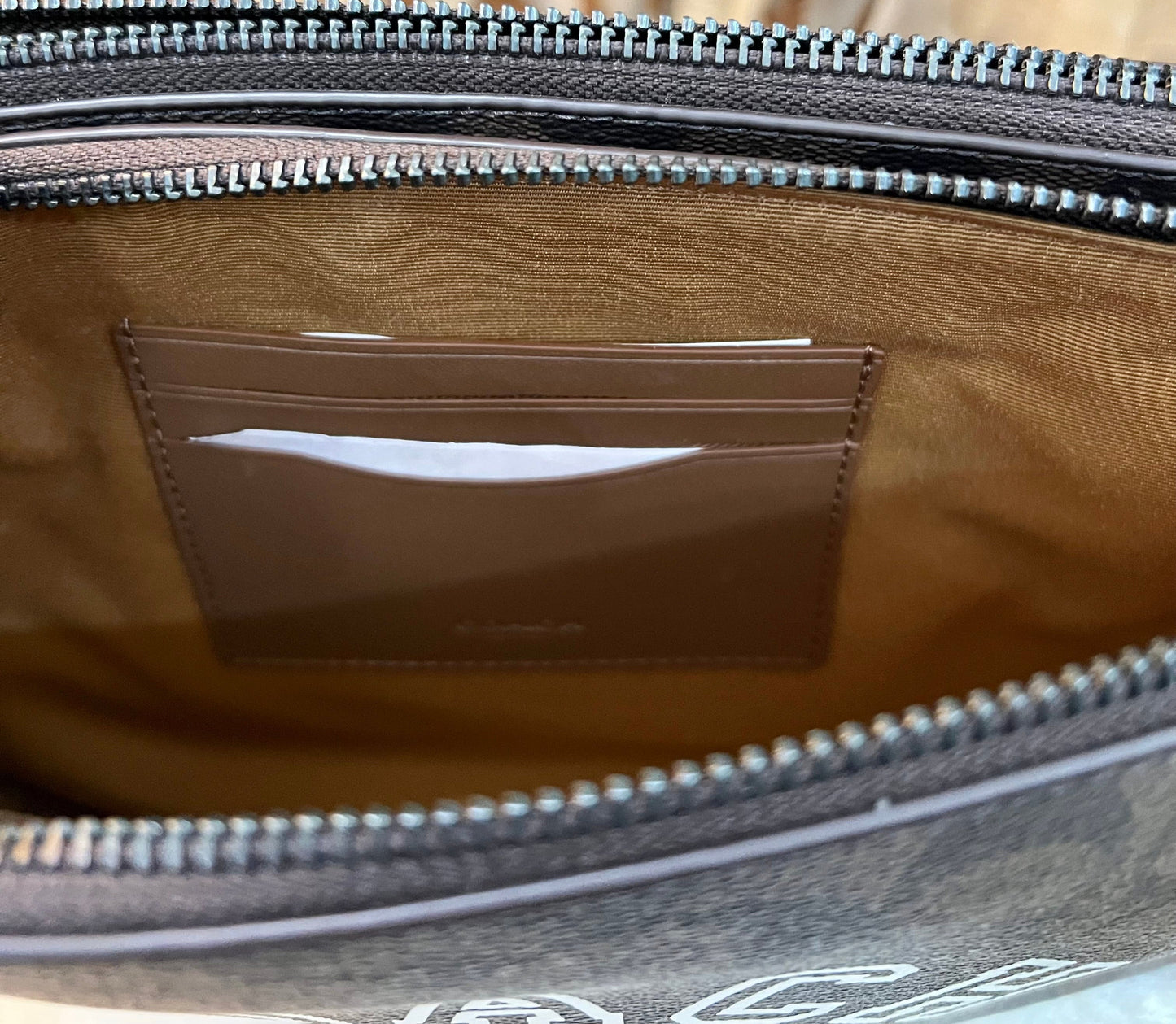 COACH EVERETTE CROSSBODY IN SIGNATURE CANVAS WITH VARSITY MOTIF
