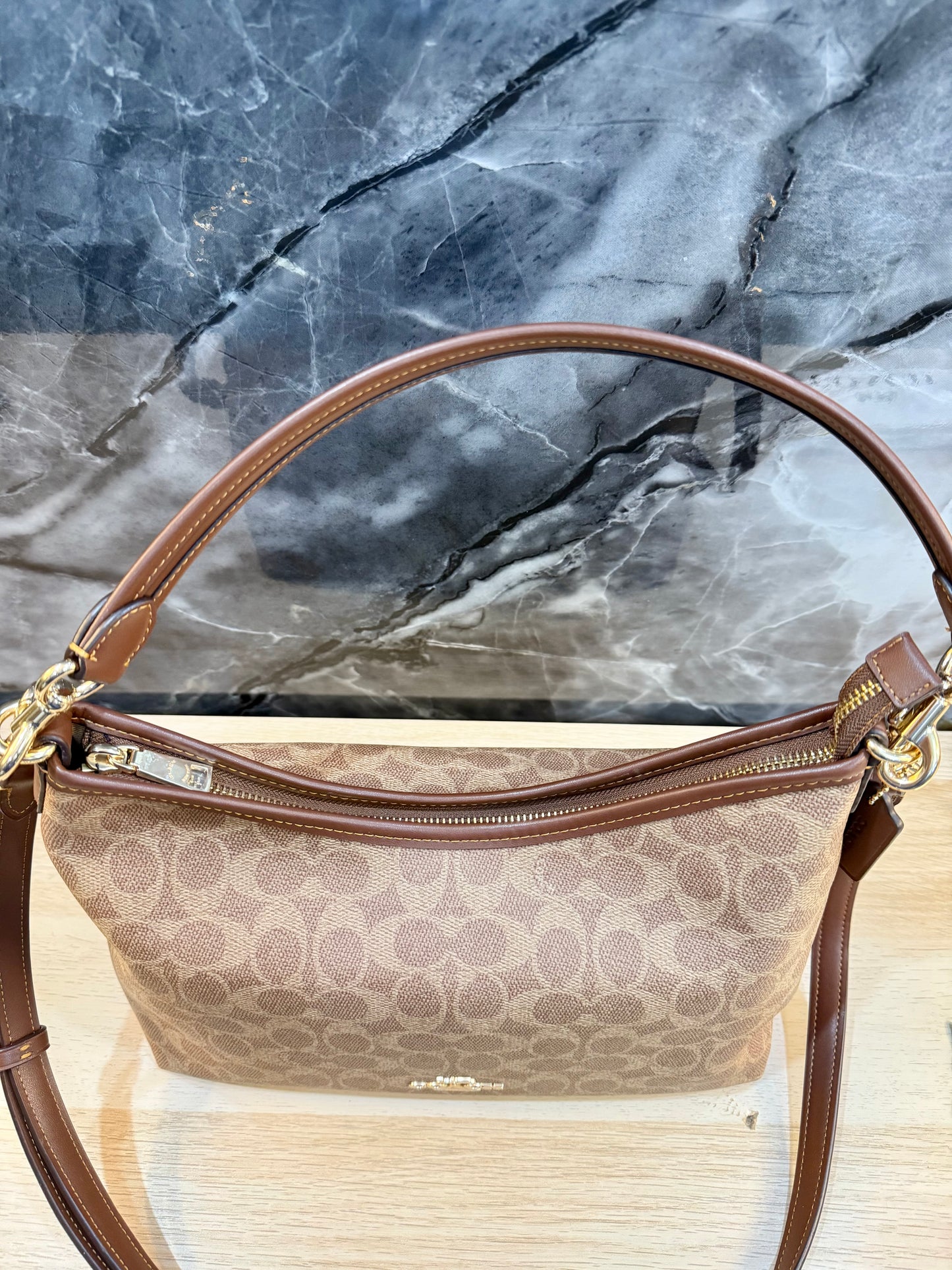 COACH MEDIUM LAUREL SIGNATURE COATED CANVAS