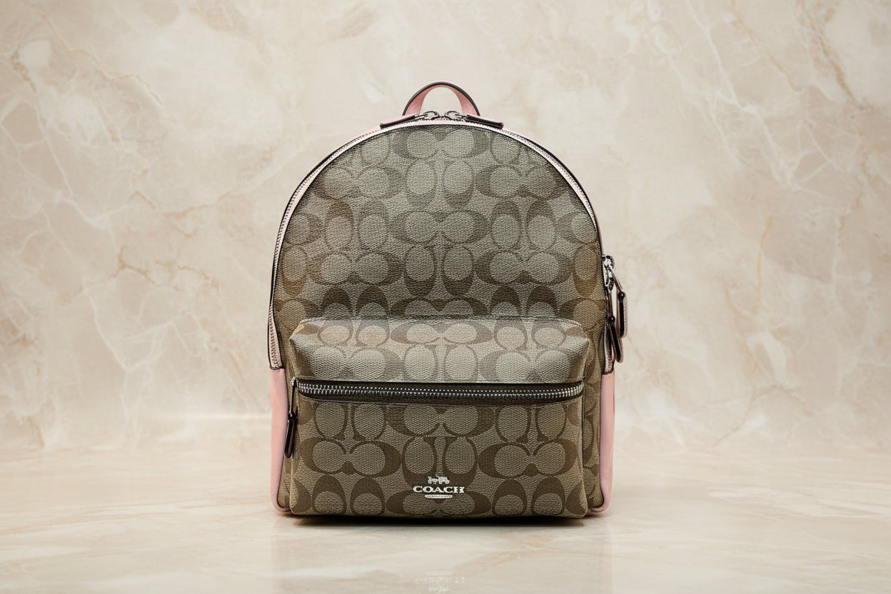 حقيبة ظهر متوسطة الحجم من كوتش تشارلي - لون بني/وردي مميز