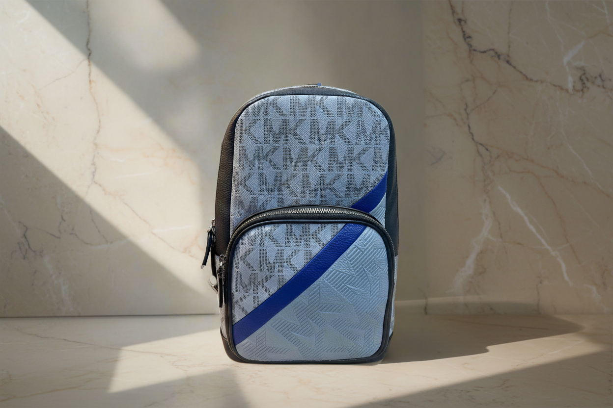 MICHAEL KORS COOPER COMMUTER SLINGPACK CHAMBRAY