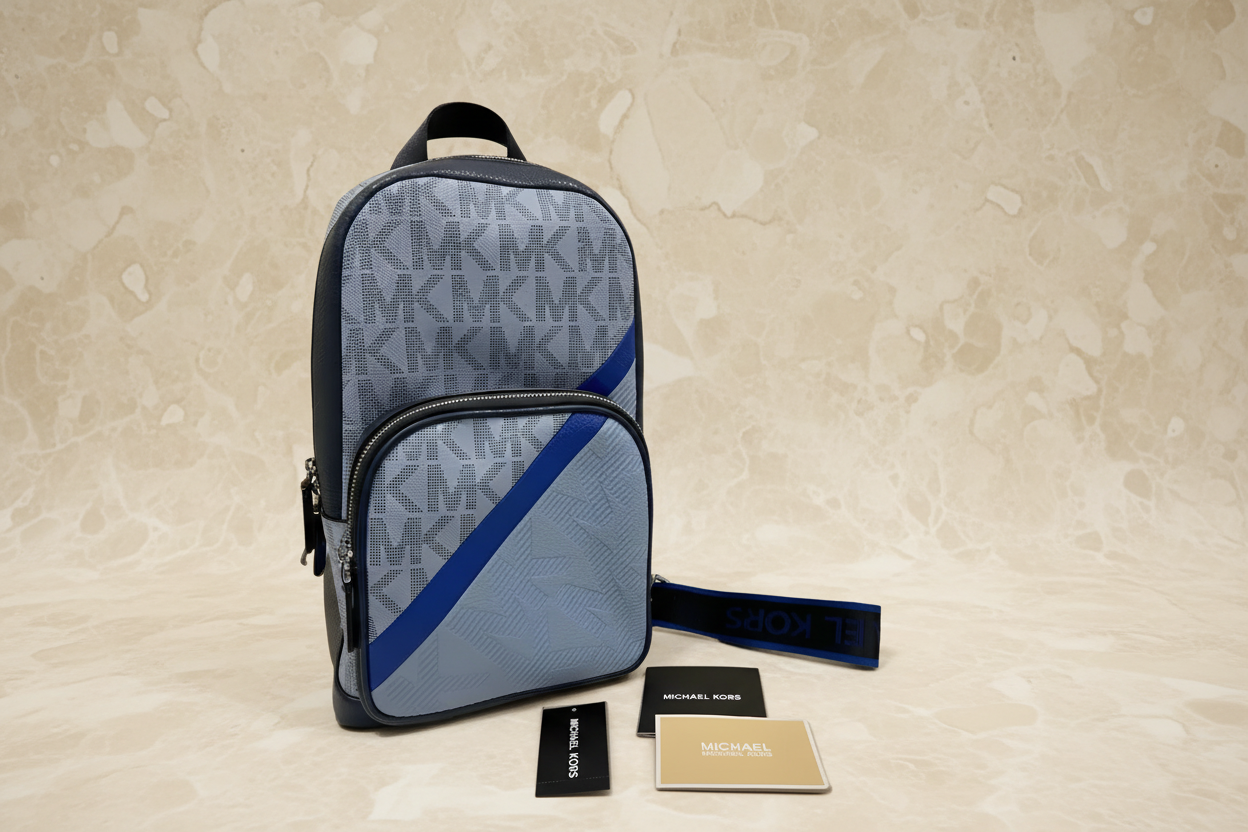 MICHAEL KORS COOPER COMMUTER SLINGPACK CHAMBRAY