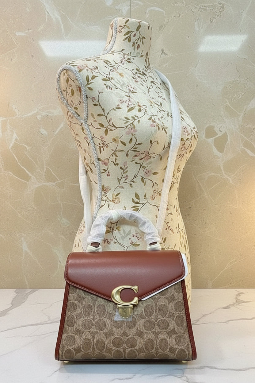 حقيبة كوتش سامي 21 بمقبض علوي - لون بني صدئ مميز