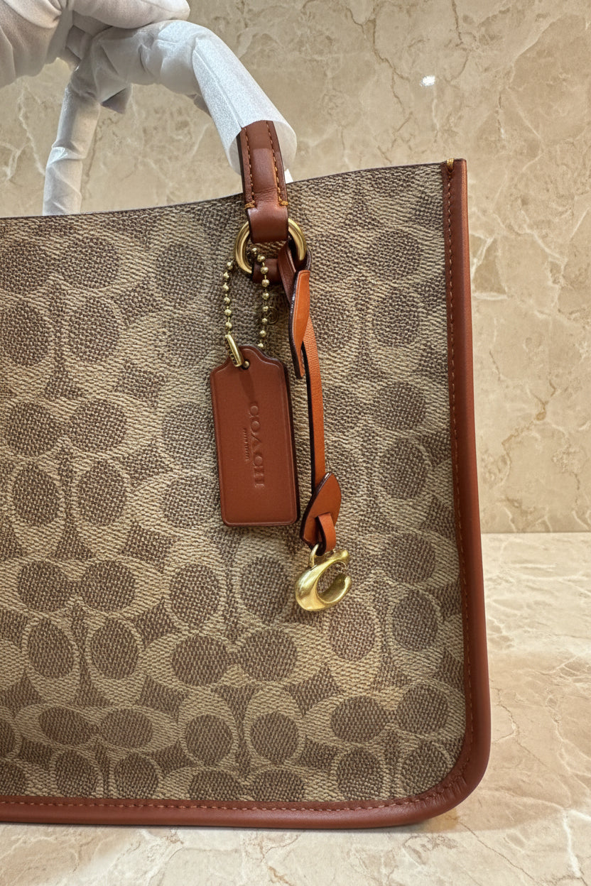COACH TYLER CARRYALL 28 IN SIGNATURE CANVAS