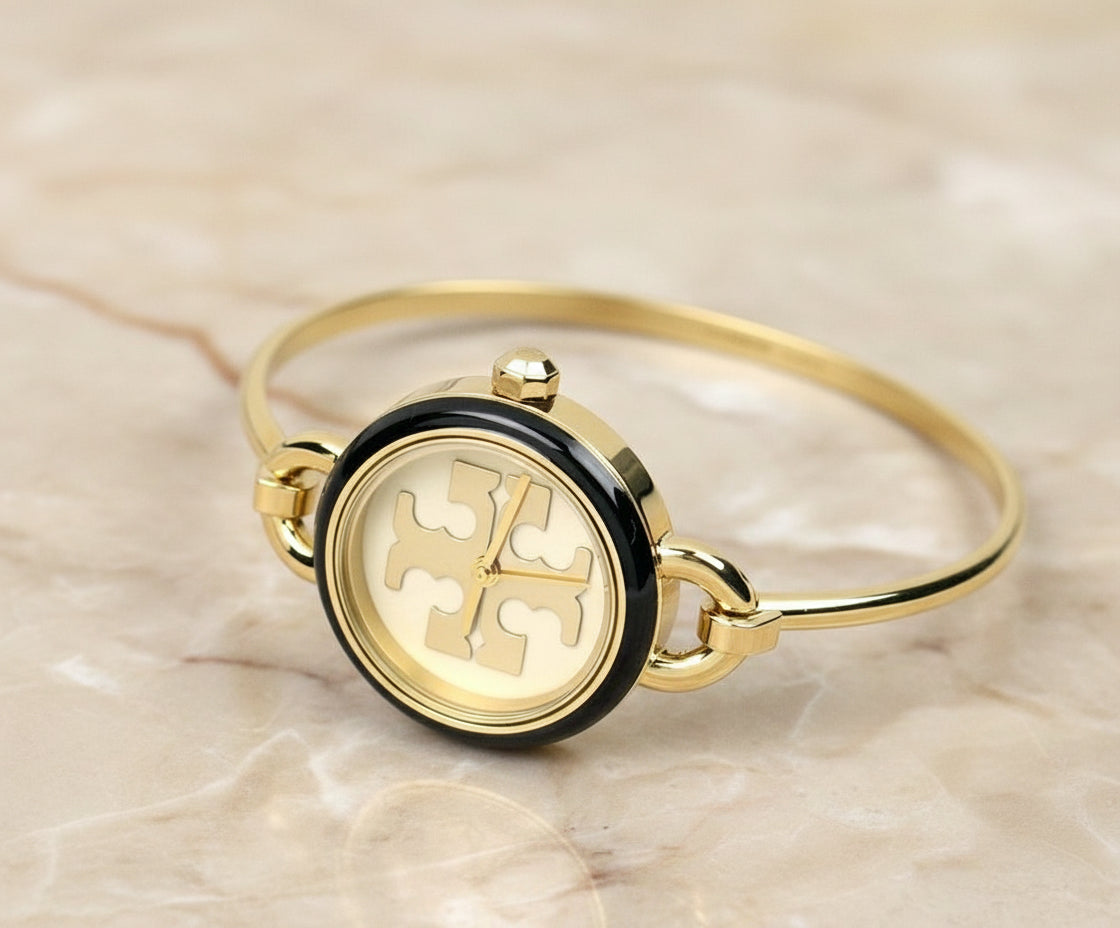 ساعة توري بورش الصغيرة ذات الأزرار القابلة للتبديل