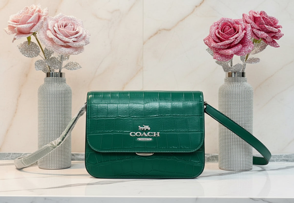 حقيبة كروسبودي كوتش برين ذات غطاء قلاب - لون اليشم