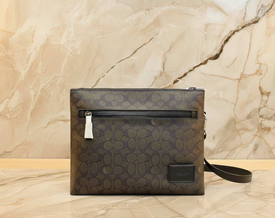 COACH CARRIER CROSSBODY BAG IN SIGNATURE CANVAS - MAHOGANY COLOR