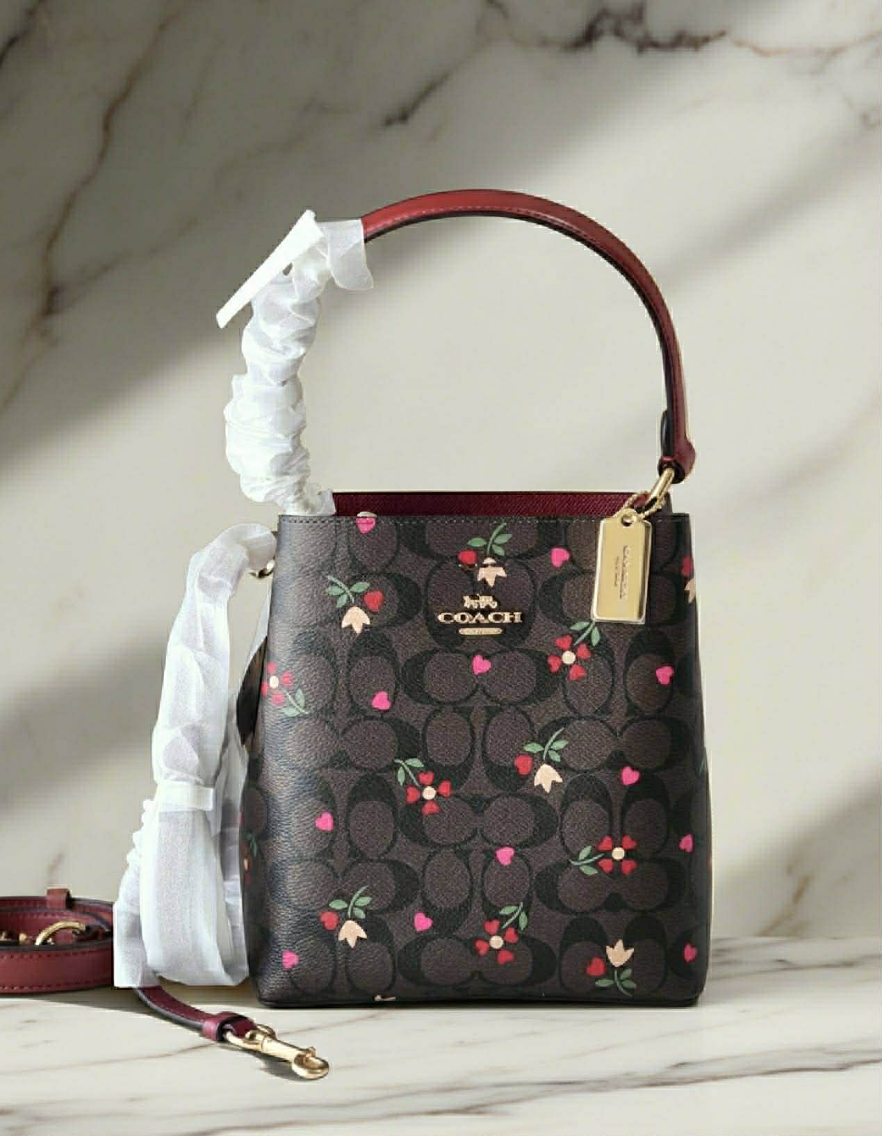 COACH SMALL TOWN BUCKET IN SIGNATURE CANVAS WITH HEART PETAL PRINT