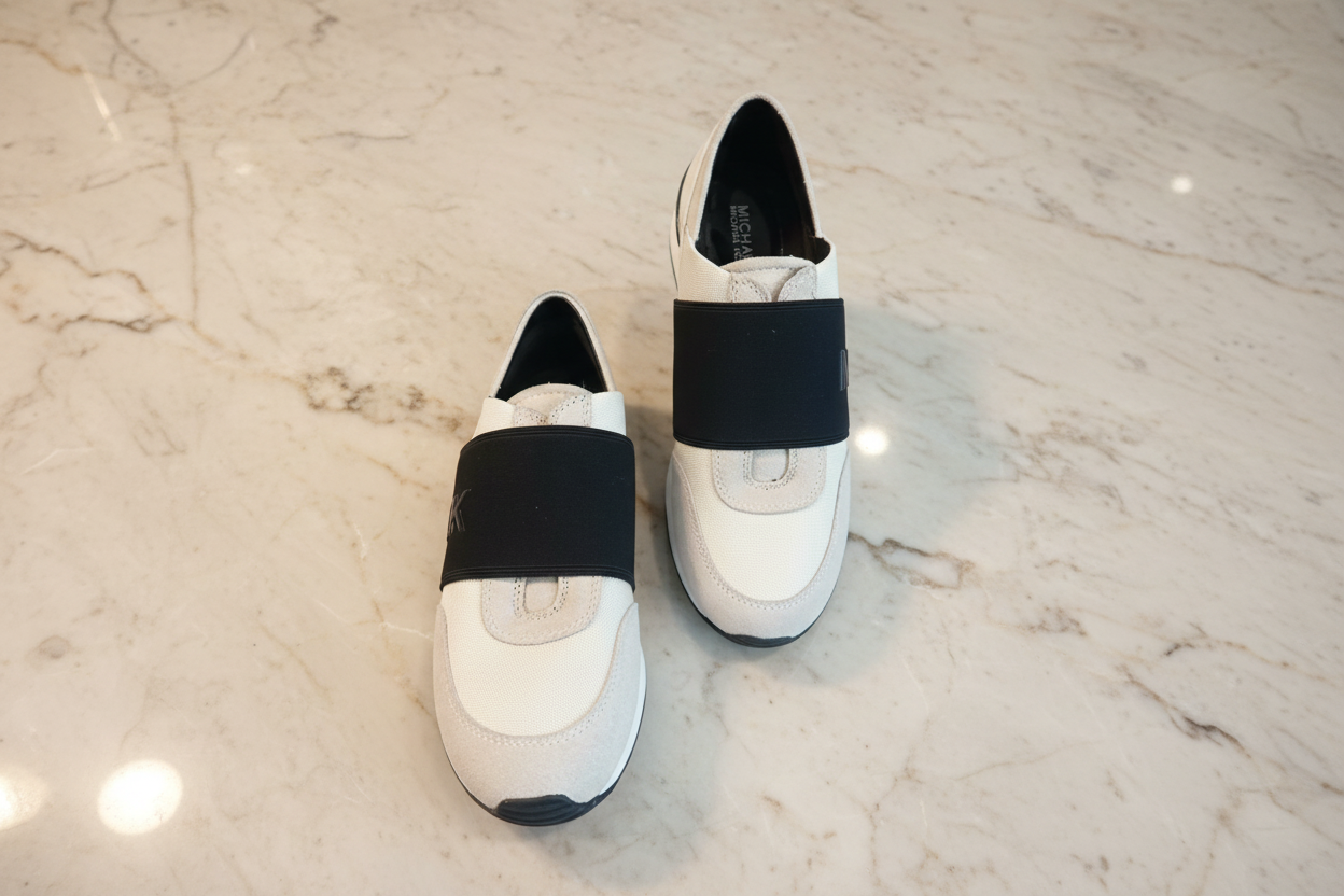 أحذية رياضية من مايكل كورس - بها عيوب - شاهد الصور
