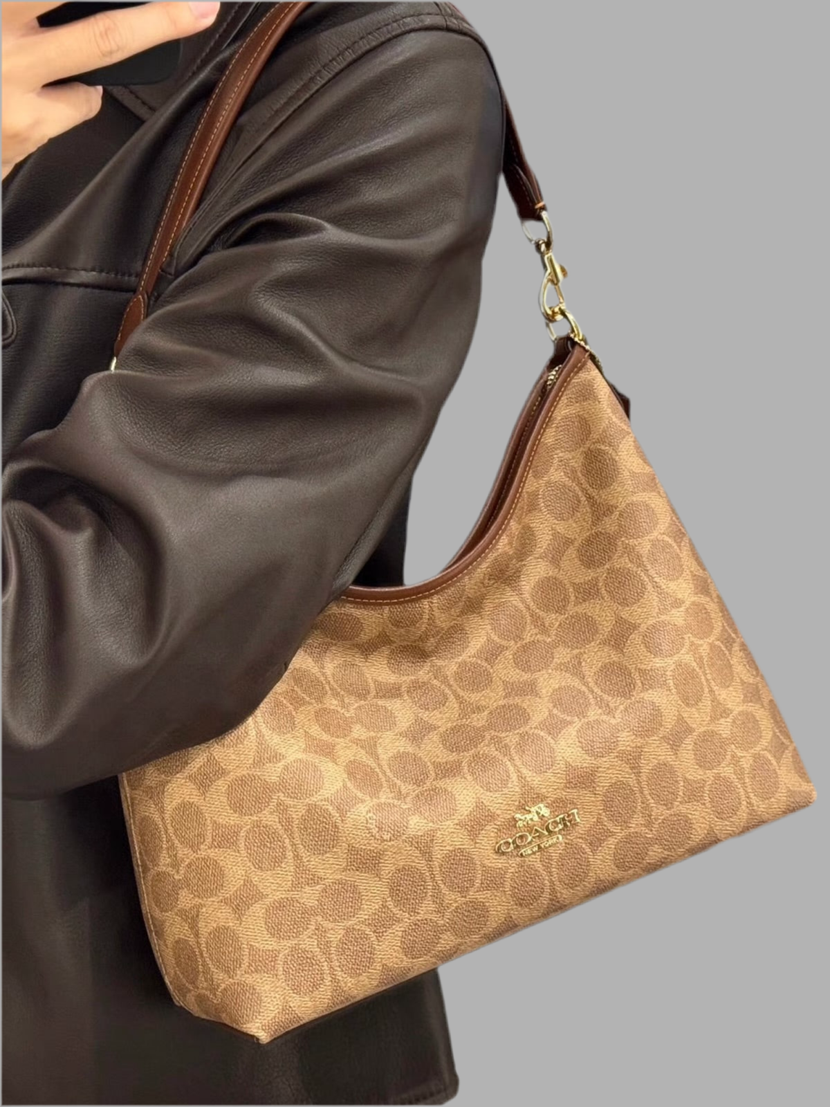 COACH MEDIUM LAUREL SIGNATURE COATED CANVAS