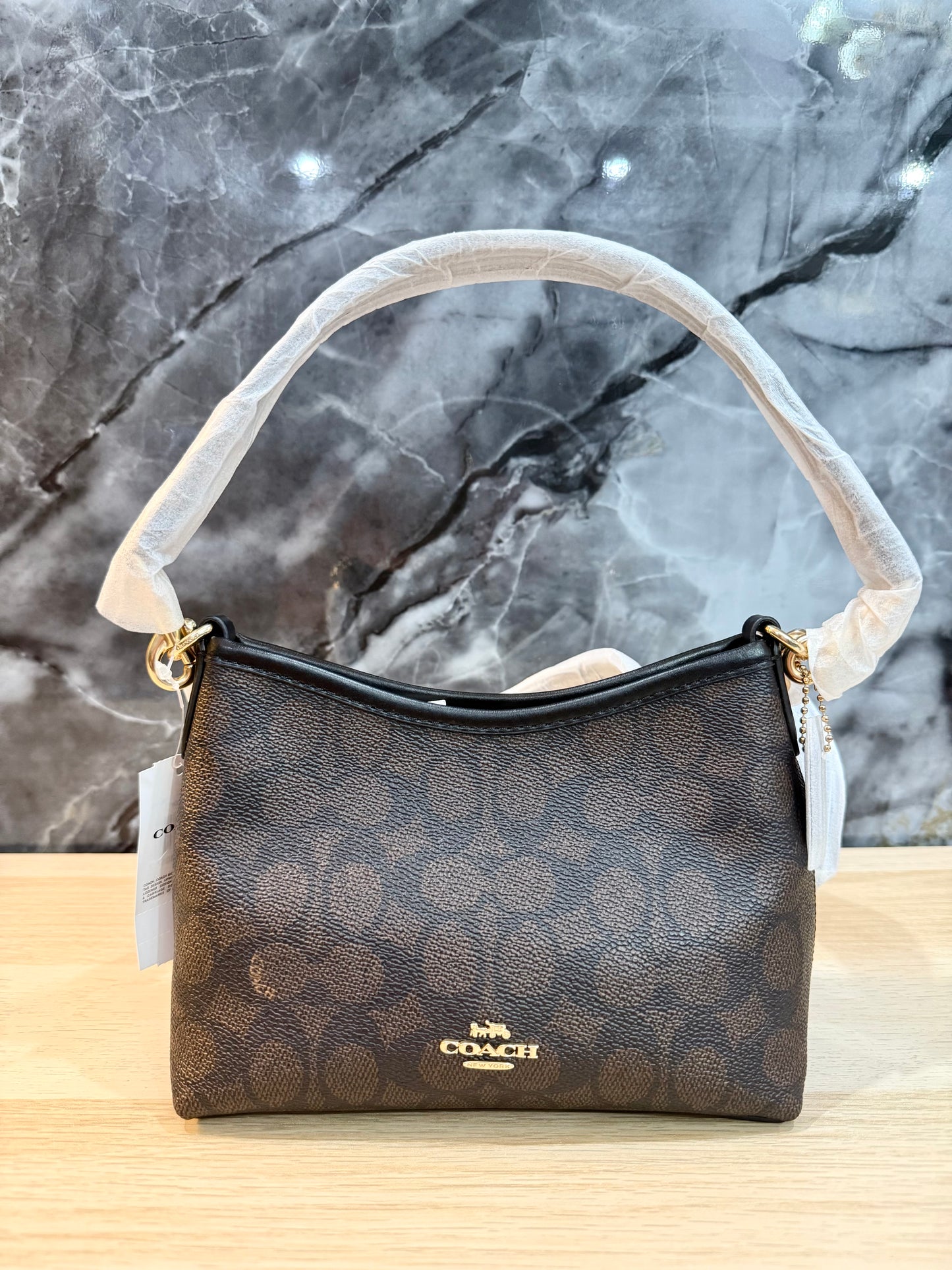 COACH SMALL LAUREL SIGNATURE COATED CANVAS