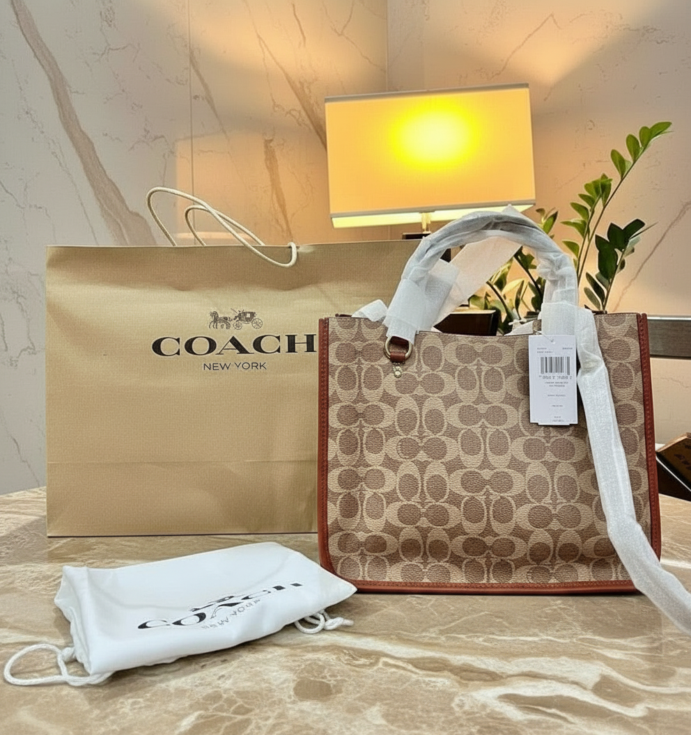 COACH TYLER CARRYALL 28 IN SIGNATURE CANVAS