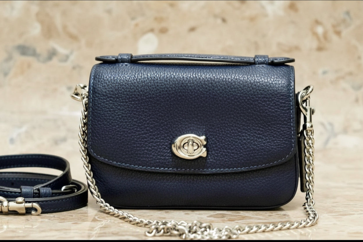 حقيبة كروس بودي من كوتش كاسي 17