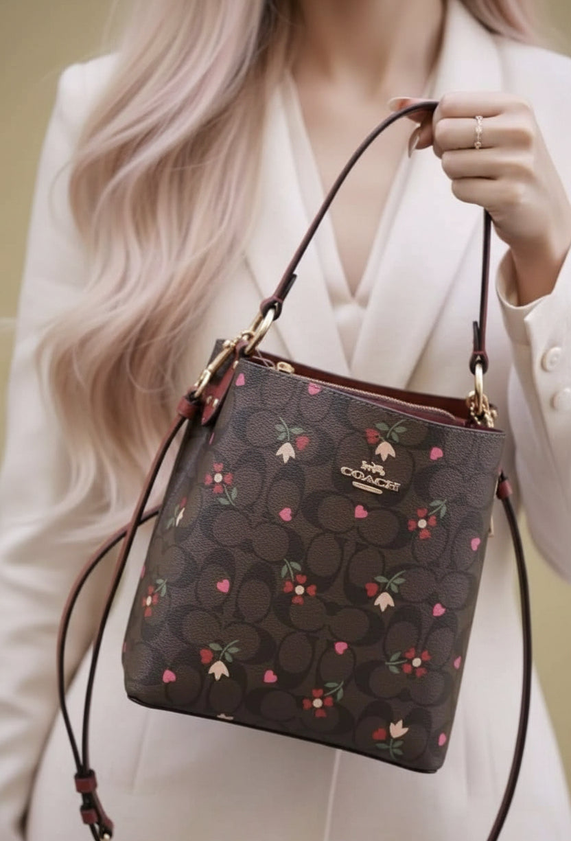 COACH SMALL TOWN BUCKET IN SIGNATURE CANVAS WITH HEART PETAL PRINT