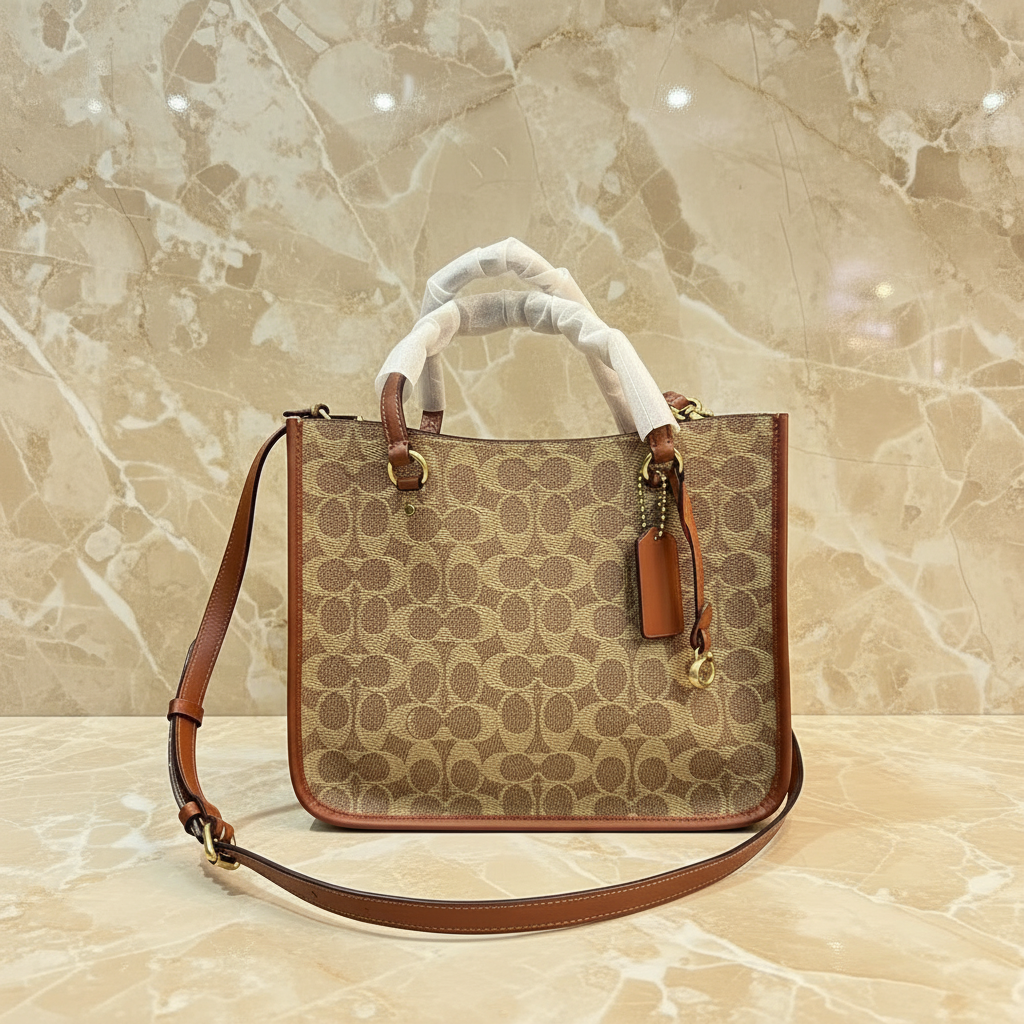 COACH TYLER CARRYALL 28 IN SIGNATURE CANVAS