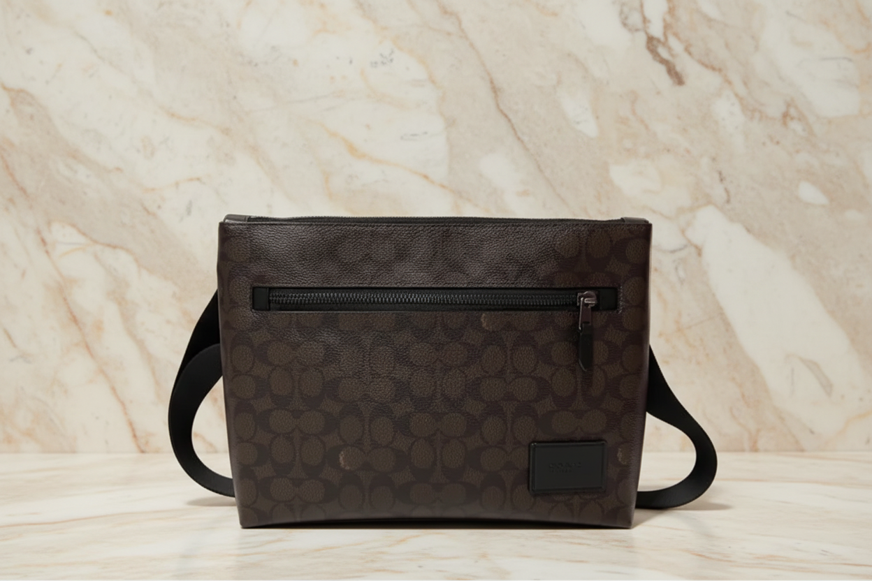 COACH CARRIER CROSSBODY BAG IN SIGNATURE CANVAS - MAHOGANY COLOR