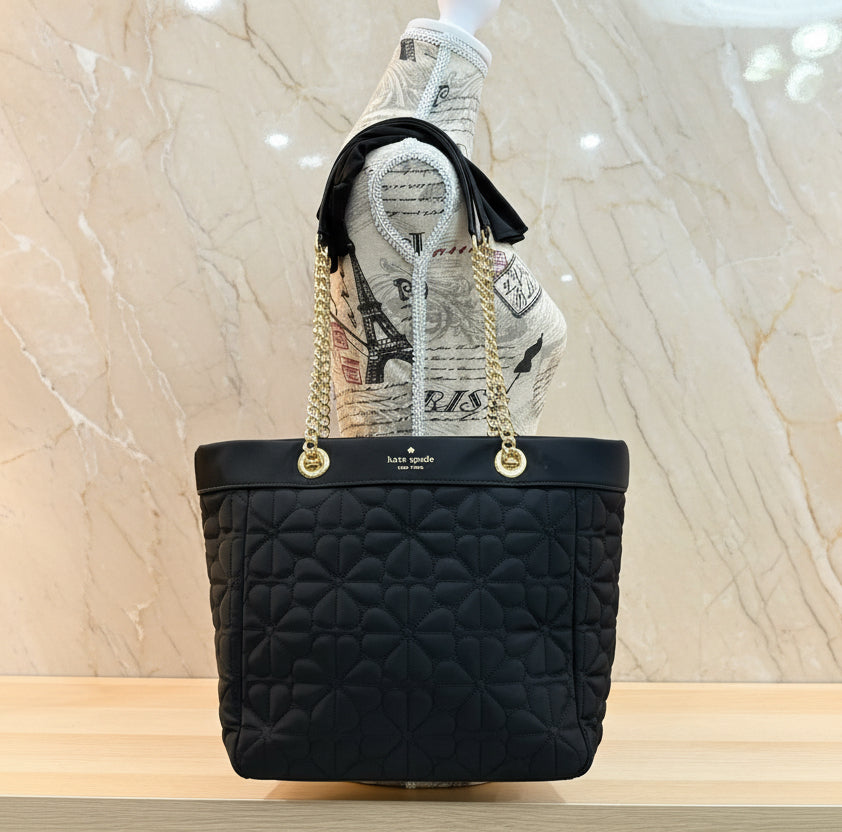 حقيبة كيت سبيد المبطنة والمزينة بالزهور - متوسطة الحجم - سوداء