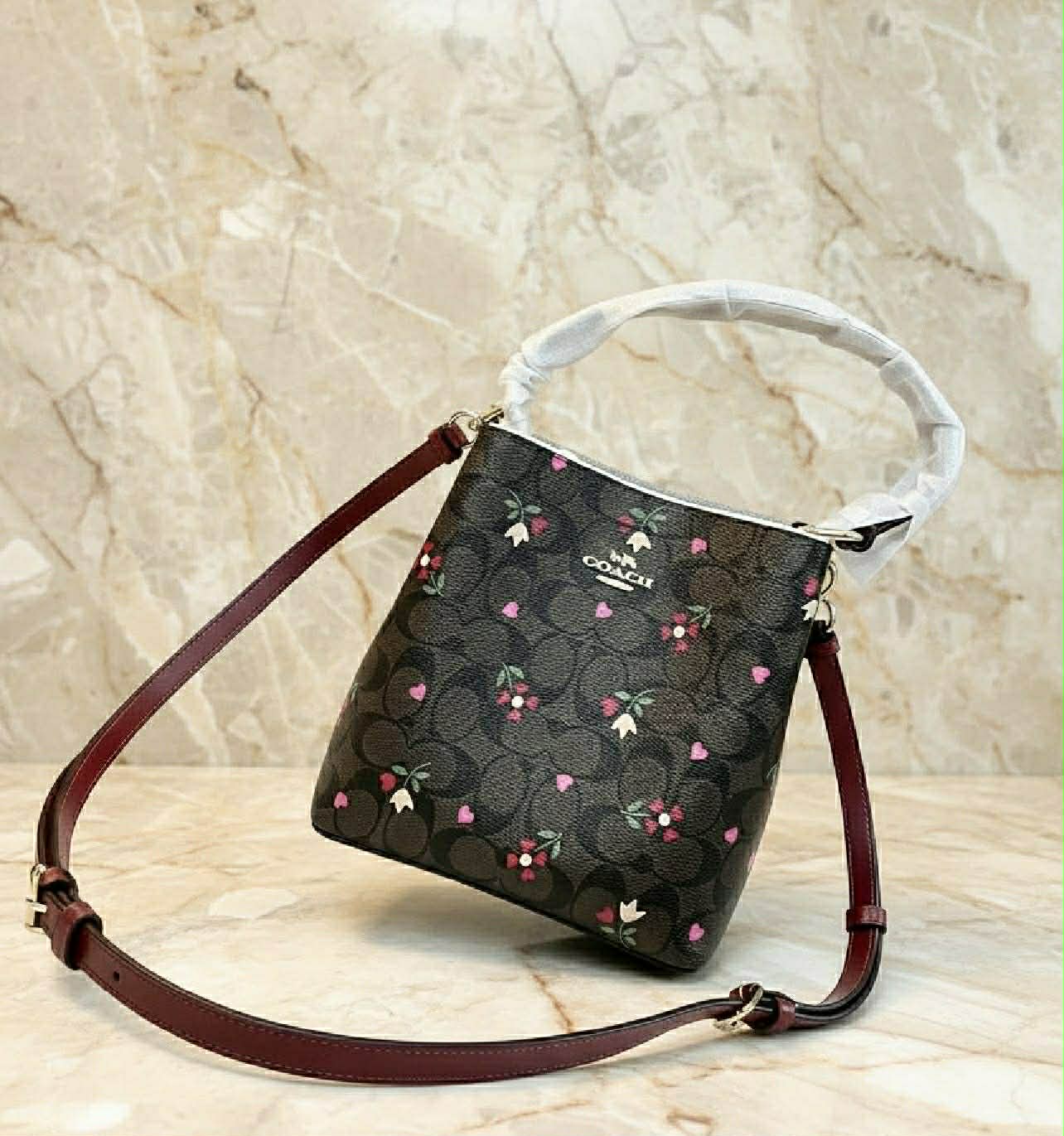 COACH SMALL TOWN BUCKET IN SIGNATURE CANVAS WITH HEART PETAL PRINT