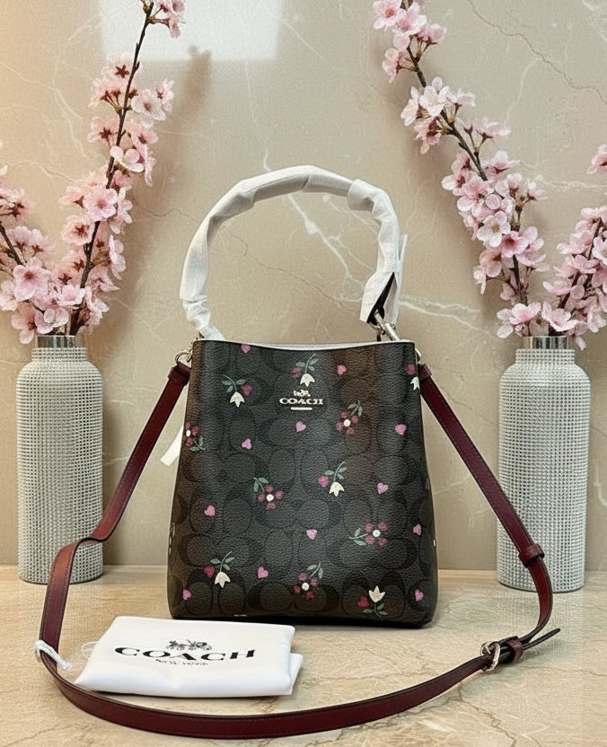 COACH SMALL TOWN BUCKET IN SIGNATURE CANVAS WITH HEART PETAL PRINT