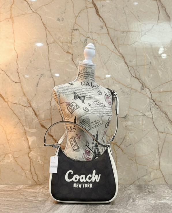 حقيبة كتف/حقيبة كروس بودي من كوتش سكريبت تيري هوبو - متوسطة الحجم