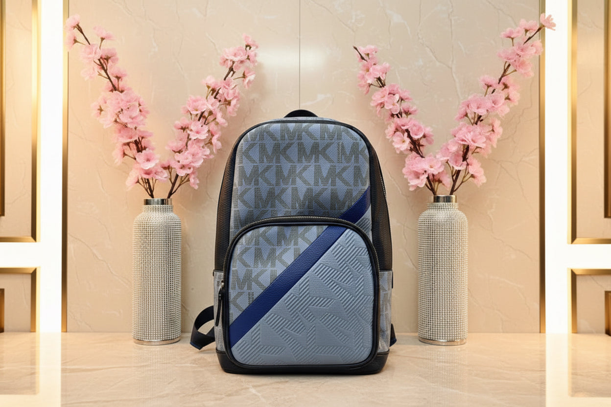 MICHAEL KORS COOPER COMMUTER SLINGPACK CHAMBRAY