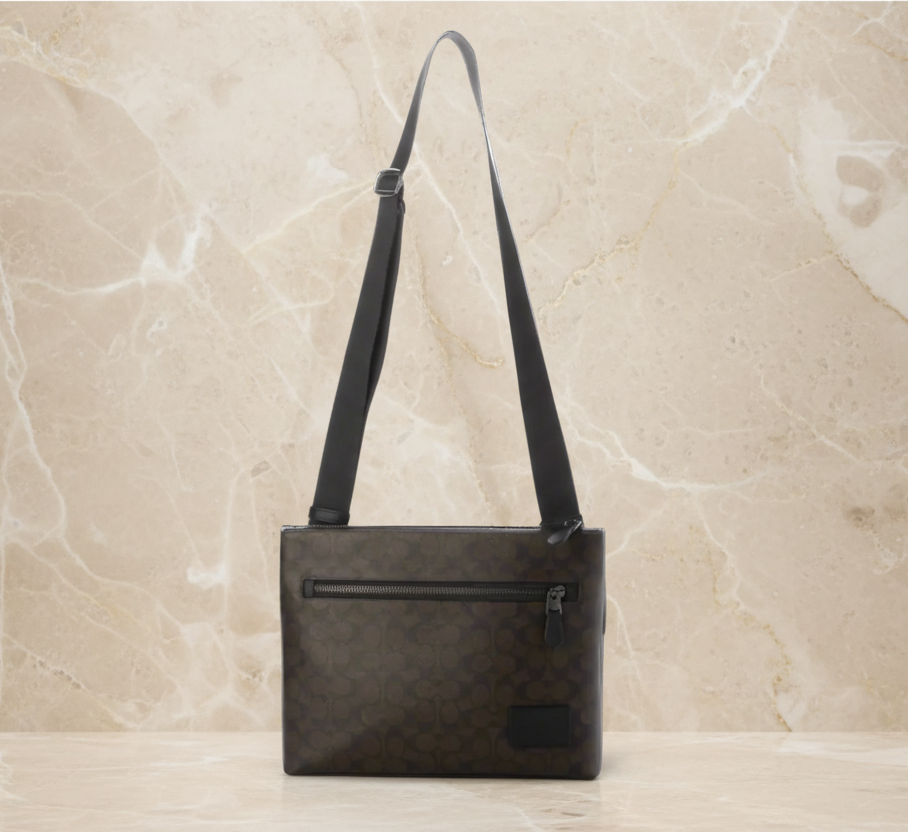 COACH CARRIER CROSSBODY BAG IN SIGNATURE CANVAS - MAHOGANY COLOR