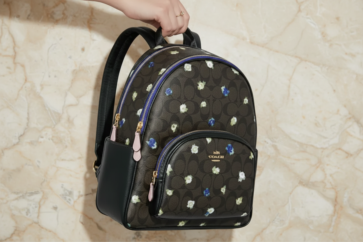 COACH COURT MEDIUM  BACKPACK IN SIGNATURE CANVAS WITH VINTAGE MINI ROSE PRINT