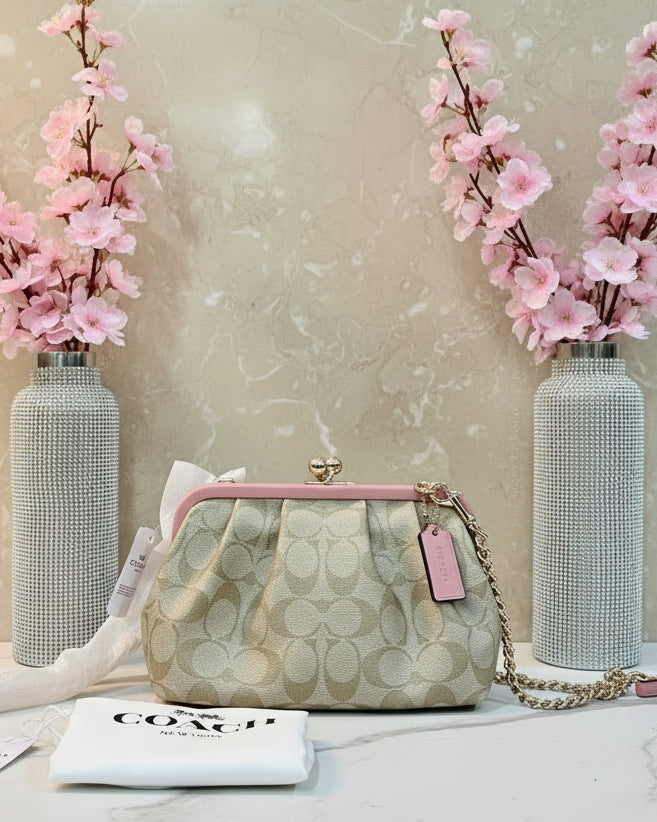 COACH NORA KISSLOCK CLUTCH/CROSSBODY IN SIGNATURE CHALK/IVORY/PINK