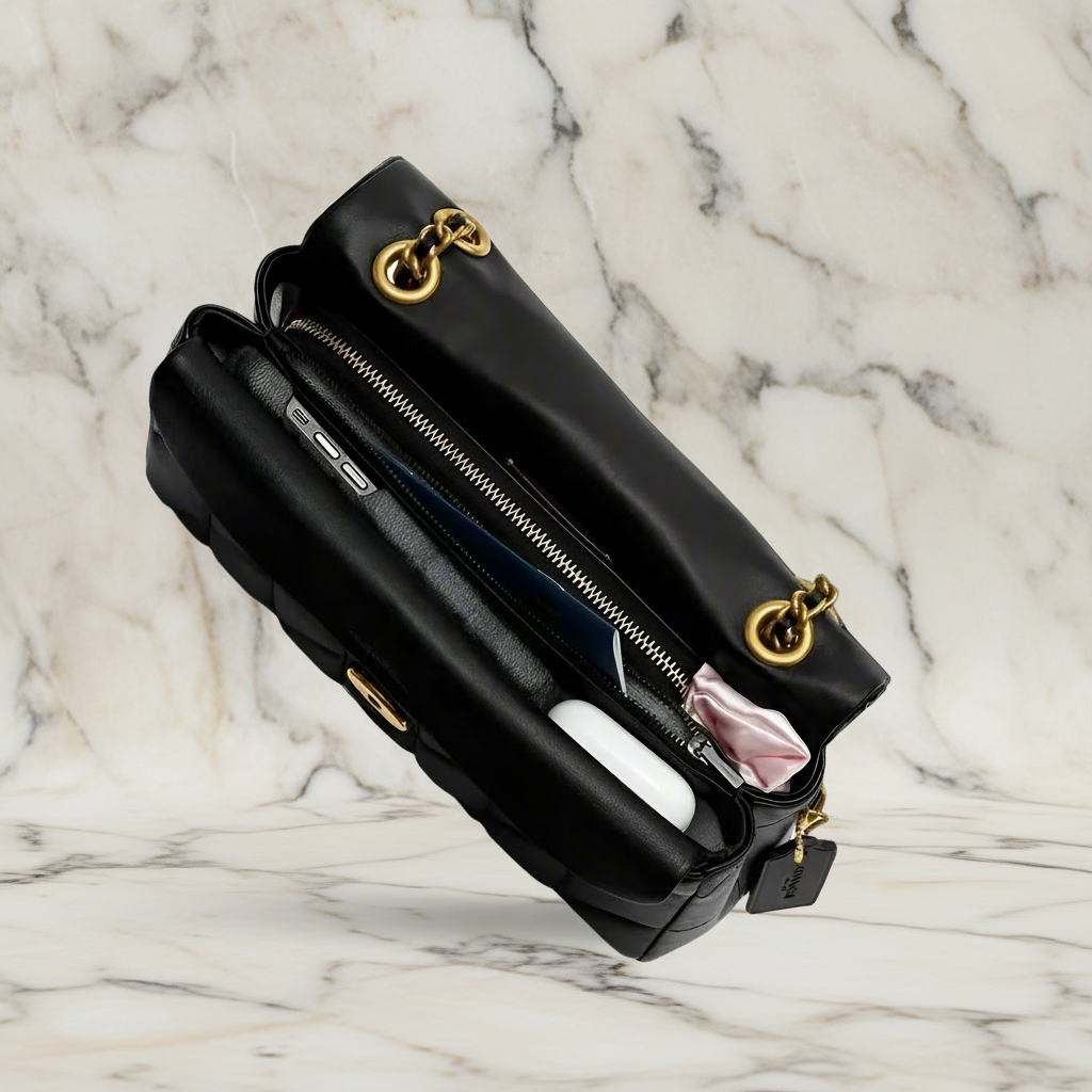 حقيبة كوتش مبطنة بنقشة تابي 20 - أسود - جلد نابا