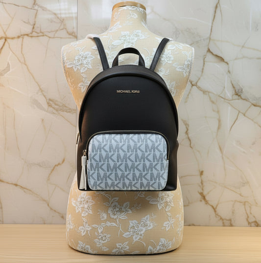 حقيبة ظهر متوسطة الحجم من مايكل كورس طراز إيرين - بني مميز/أبيض