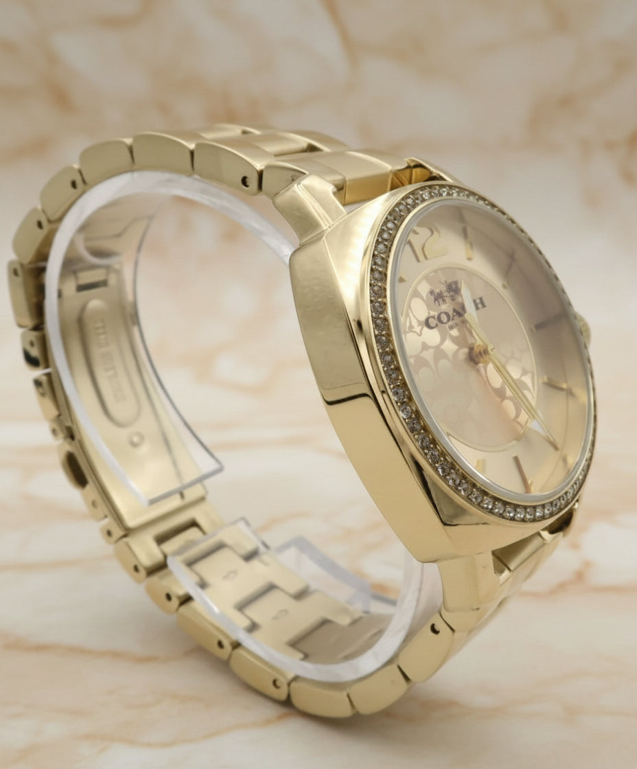 ساعة كوتش بوي فريند ذهبية من الفولاذ المقاوم للصدأ