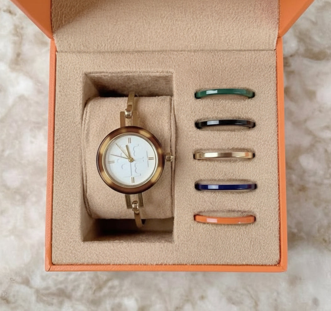 ساعة توري بورش الصغيرة ذات الأزرار القابلة للتبديل