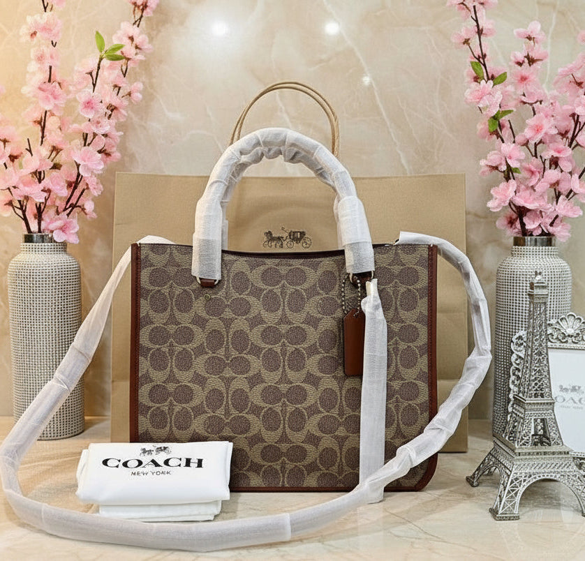 COACH TYLER CARRYALL 28 IN SIGNATURE CANVAS