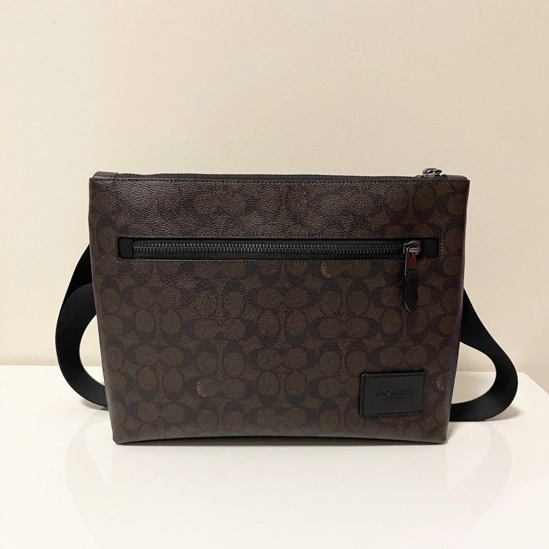 COACH DISCTRICT CROSSBODY BAG IN SIGNATURE CANVAS - MAHOGANY COLOR