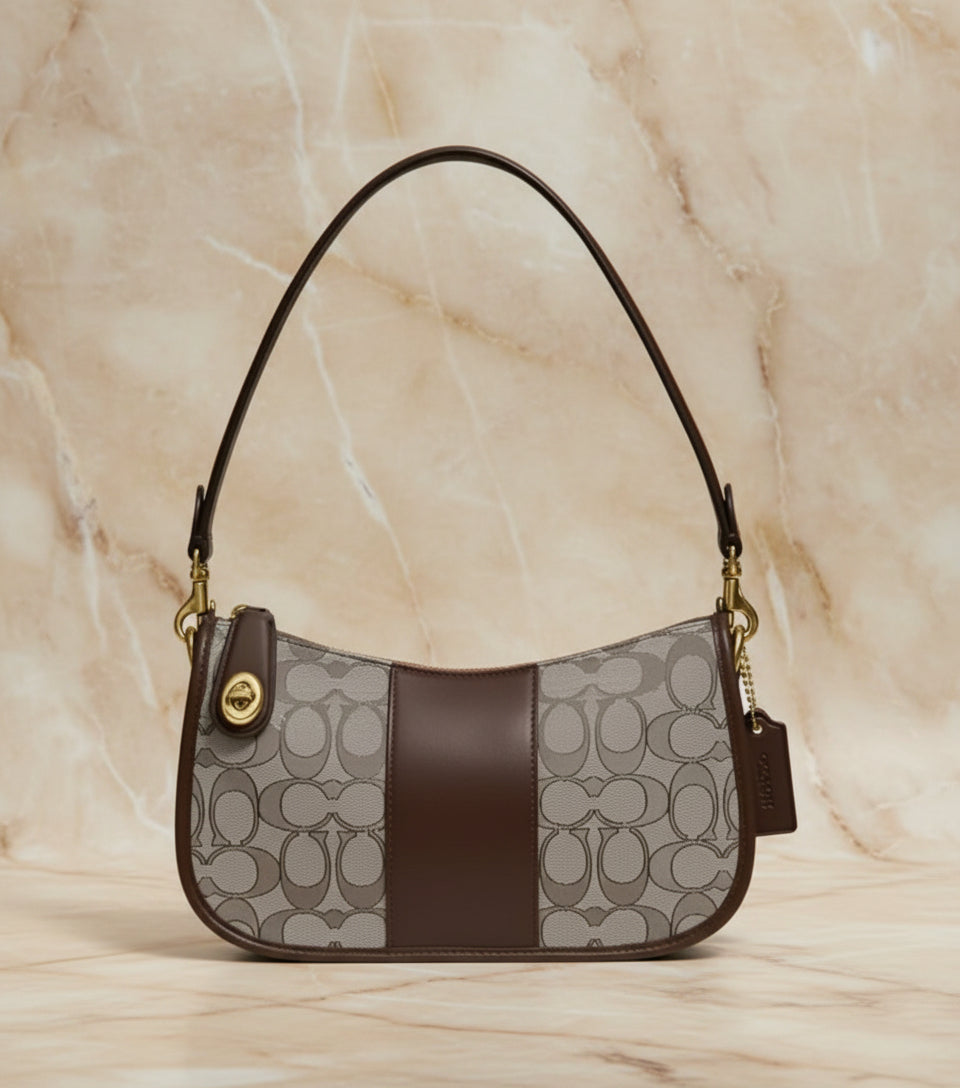 تخفيضات هائلة! ‼️‼️ حقيبة يد من قماش الجاكار من ماركة كوتش - بدون بطاقة السعر