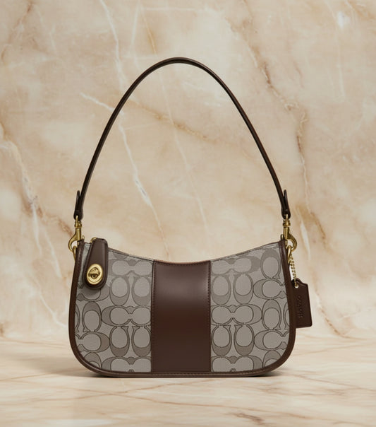 تخفيضات هائلة! ‼️‼️ حقيبة يد من قماش الجاكار من ماركة كوتش - بدون بطاقة السعر