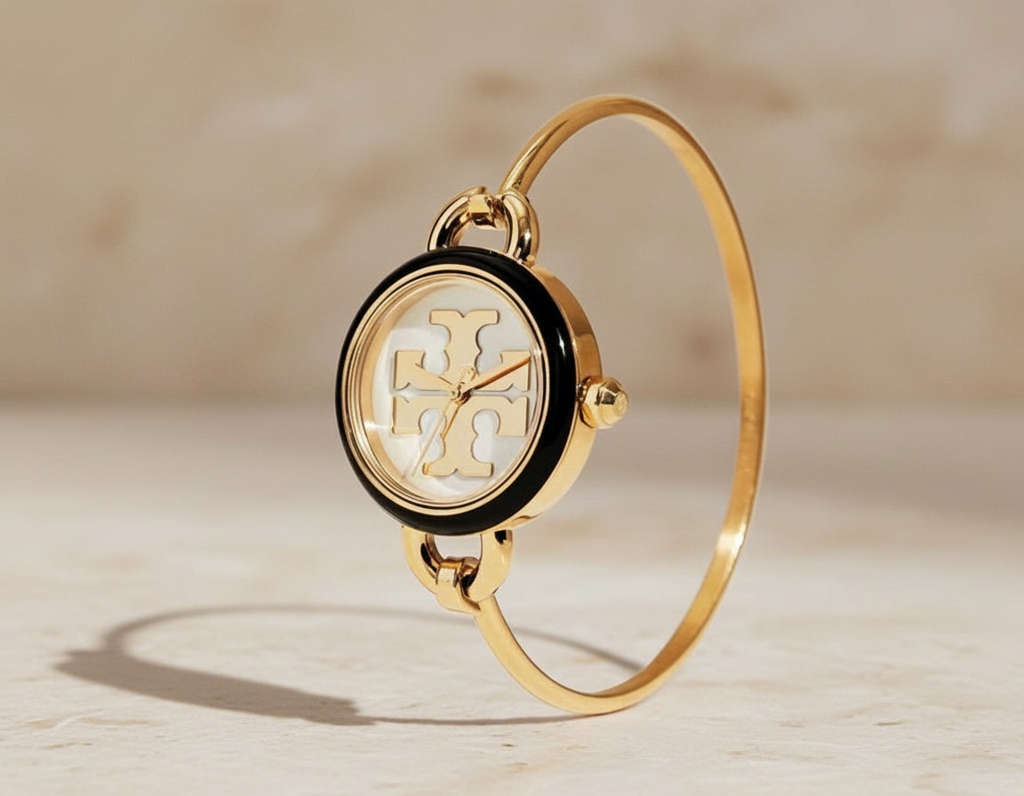 ساعة توري بورش الصغيرة ذات الأزرار القابلة للتبديل