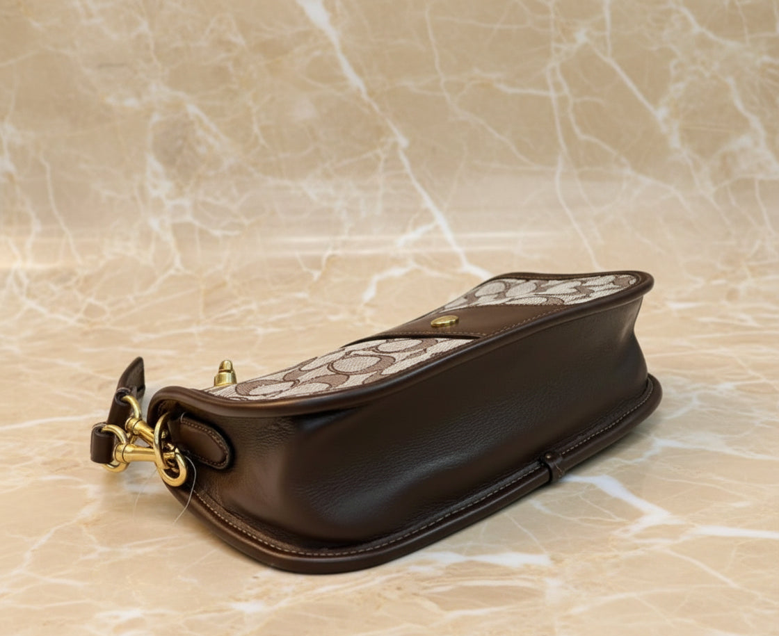 تخفيضات هائلة! ‼️‼️ حقيبة يد من قماش الجاكار من ماركة كوتش - بدون بطاقة السعر