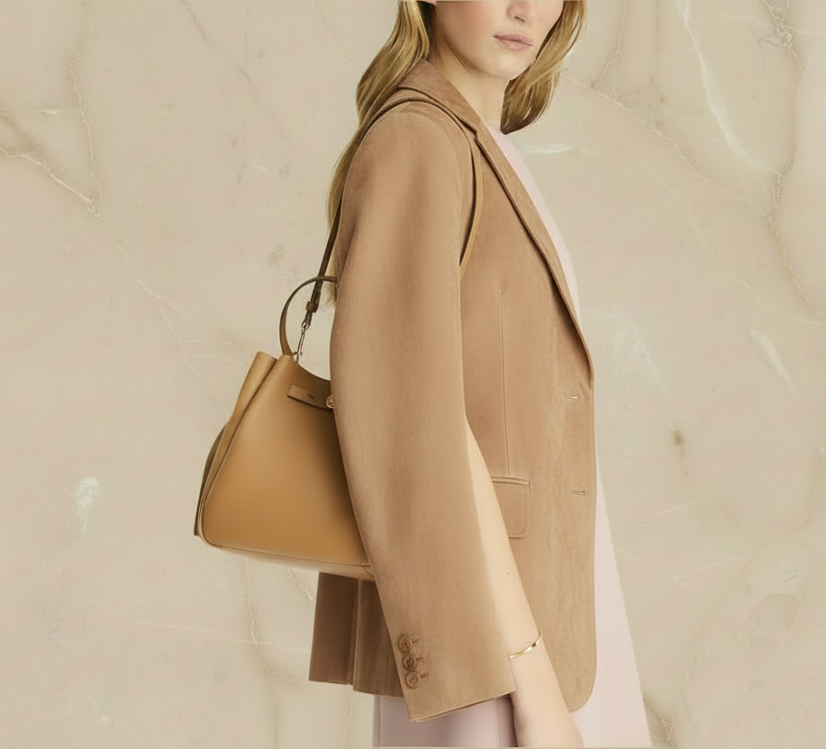 SALE!!! WITH CREASE IN FRONT DUE TO CARGO HANDLING - TORY BURCH SMALL ROMY BUCKET - BROWN